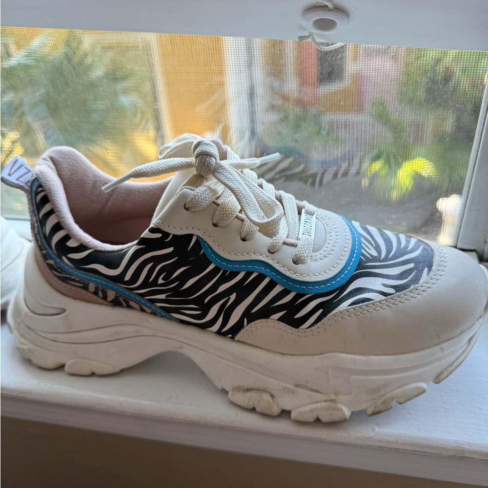 Zebra Print Sneakers with Blue Accent